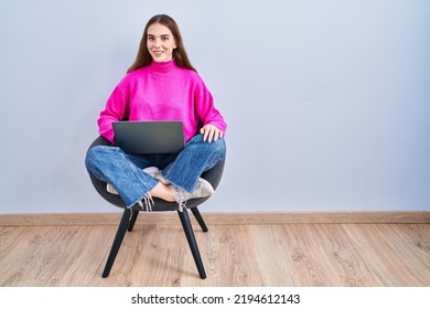 Young Hispanic Girl Working Using Computer Laptop With A Happy And Cool Smile On Face. Lucky Person. 