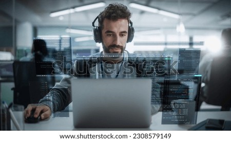 Young Hispanic Male Software Developer Working in Technological Start-Up Office. Latin Specialist Programming Monitoring Solutions. VFX Hologram Edit Visualizing Coding Interfaces, Opened Windows