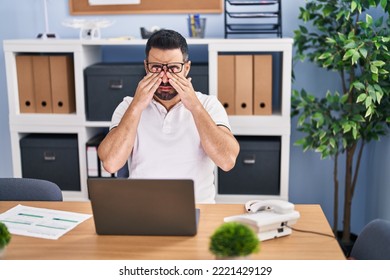 Young Hispanic Man Business Worker Stressed Working At Office