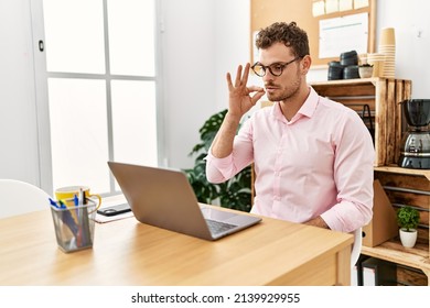 Young Hispanic Man Having Video Call Communicating With Deaf Sign Language At Office