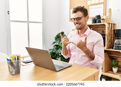 Young Hispanic Man Having Video Call Communicating With Deaf Sign Language At Office