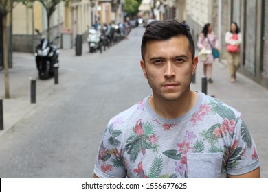  Young Hispanic man looking at camera