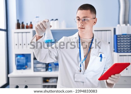 Similar – Image, Stock Photo Man scientist working at the laboratory. Selective focus.