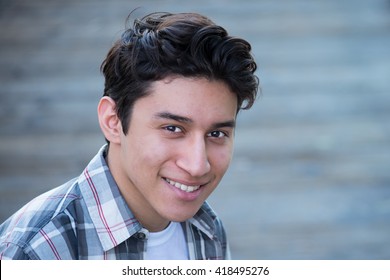 Young Hispanic Man Smiling
