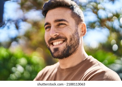 Young Hispanic Man Smiling Confident Standing At Park