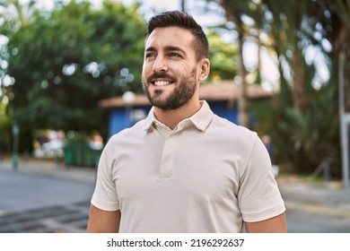 Young hispanic man smiling confident walking at street - Powered by Shutterstock