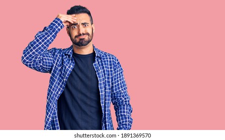 Young hispanic man wearing casual clothes worried and stressed about a problem with hand on forehead, nervous and anxious for crisis  - Powered by Shutterstock