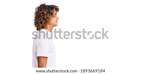 Similar – Brunette surfer woman with top and bikini kissing surfboard