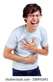 Young hispanic man wearing glasses, blue t-shirt and jeans standing with hands on his belly and loudly laughing isolated on white background - laughter concept
