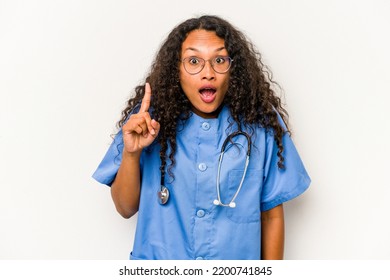 Young Hispanic Nurse Woman Isolated On White Background Having An Idea, Inspiration Concept.