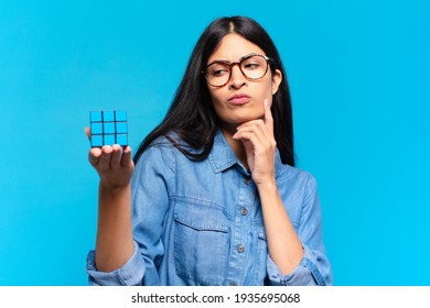 young hispanic student  solving a intelligence challenge