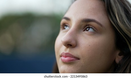 Young Hispanic Woman Closing Eyes In Meditation. Millennial 20s Girl Opening Eyes Smiling. Closeup Female Person Face