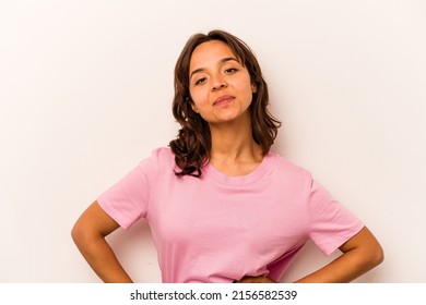 Young Hispanic Woman Isolated On White Background Confident Keeping Hands On Hips.