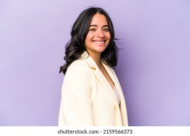 Young Hispanic Woman Isolated On Purple Background Confident Keeping Hands On Hips.