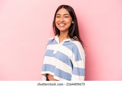 Young Hispanic Woman Isolated On Pink Background Confident Keeping Hands On Hips.