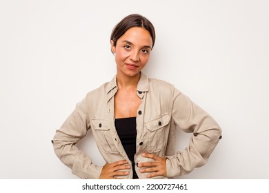 Young Hispanic Woman Isolated On White Background Confident Keeping Hands On Hips.