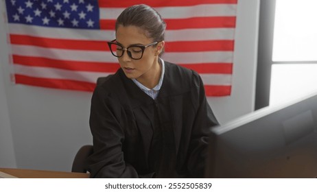 Young hispanic woman judge working in courtroom with american flag in background - Powered by Shutterstock