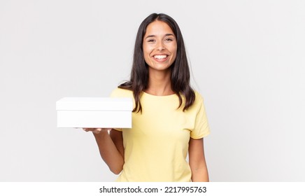 Young Hispanic Woman Looking Happy And Pleasantly Surprised