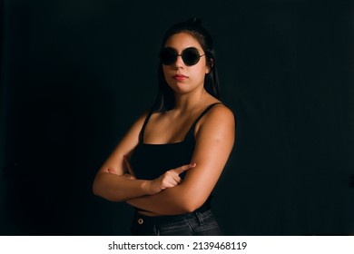 Young Hispanic Woman Portrait, Straight Hair. Wearing Sunglasses