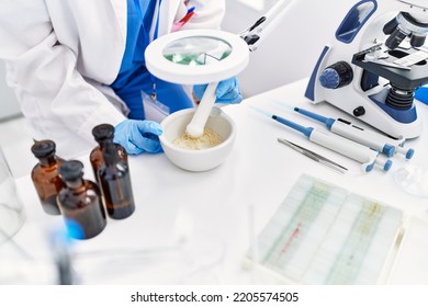 Young Hispanic Woman Scientist Hands Working At Laboratory