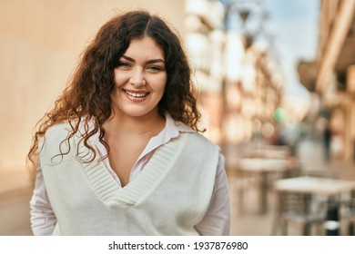 Young Hispanic Woman Smiling Happy Standing At The City.