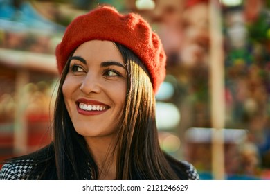 Young Hispanic Woman Smiling Happy Standing At The City.