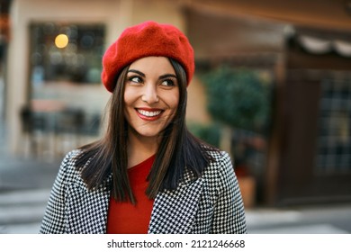 Young Hispanic Woman Smiling Happy Standing At The City.