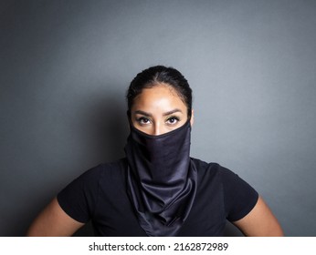 Young Hispanic Woman Wearing Bandana Type Face Mask