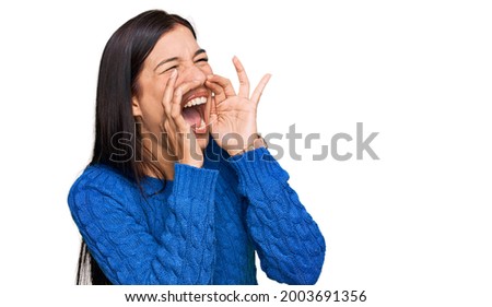 Similar – Two women sitting in a meadow laughing.