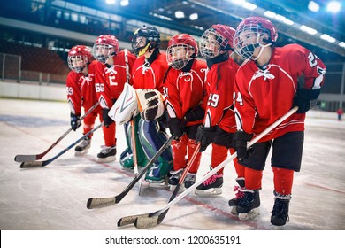 Young Hockey Team - Children Play Ice Hockey
