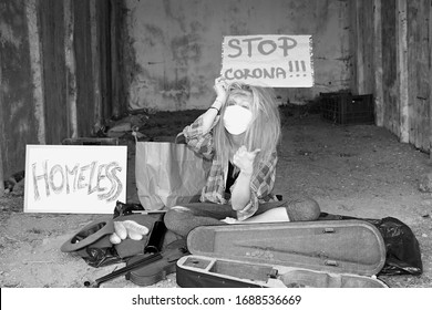 Young Homeless Woman Begging On Street And Wearing Mask To Prevent Coronavirus