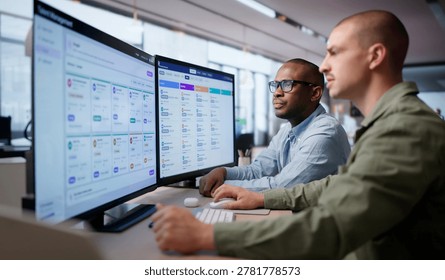 Young Human Resources Manager Analyzing Employee Performance Data On Computer.