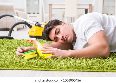 Young Husband Man Cleaning Floor At Home