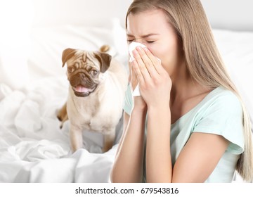 Young Ill Woman With Tissue And Pet On Background. Concept Of Allergies To Dogs