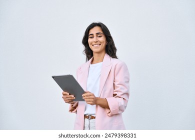 Young indian or arabic woman in business holding digital computer, looking at camera. Portrait of middle eastern Israel businesswoman using tablet pc online app for work isolated on white background. - Powered by Shutterstock