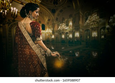 Young Indian Bride In Bridal Wear And Jewelry