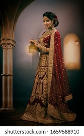 Young Indian Bride In Bridal Wear And Jewelry