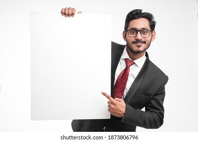 Young Indian Business Man Holding Blank Sign Board