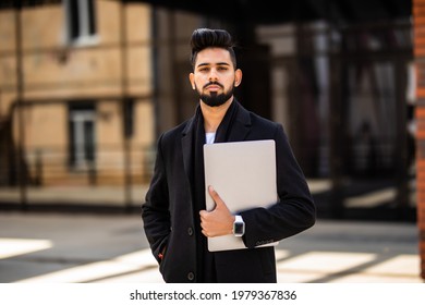 Young Indian Business Man Walking Outdoors Near Business Office