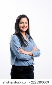 Young indian businesswoman or employee standing on white background. - Shutterstock ID 2225390809