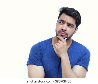 Young Indian Confused Man Scratching His Chin - Isolated White Background