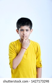 Young Indian  Cute Child Shush Expression
