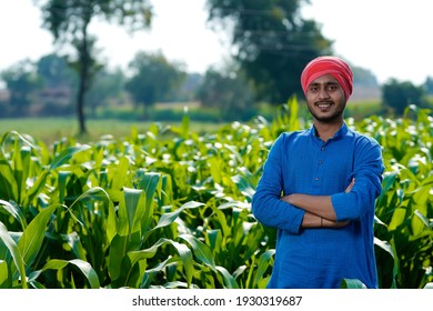 Young Indian Farmer At Corn Field