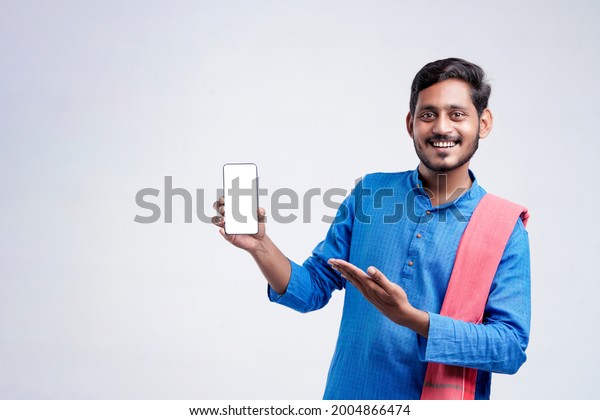 Young Indian Farmer Showing Smartphone Giving Stock Photo (Edit Now ...