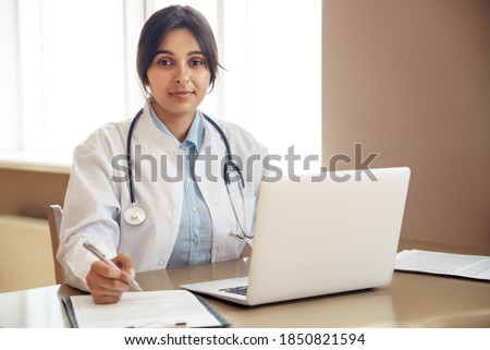 Similar – Image, Stock Photo Pretty female doctor in a geriatric clinic with elderly woman in wheelchair