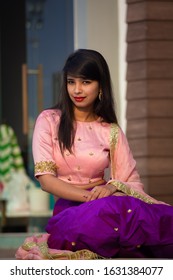 A Young Indian Female Model Posing With A Traditional Wedding Function Outfit.