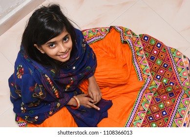 Young Indian Girl Child Wearing Colourful Traditional Ethnic Ware Gujarat, India. 