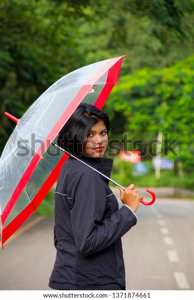 Young Indian Girl Short Hair Holding Stock Photo Edit Now 1371874661