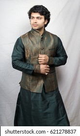 Young Indian Male Model In Artistic Green Kurta Side Pose