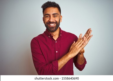 Young Indian Man Wearing Red Elegant Shirt Standing Over Isolated Grey Background Clapping And Applauding Happy And Joyful, Smiling Proud Hands Together